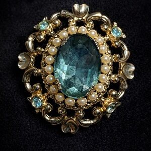 Gold-Tone Brooch with Aqua Center Stone and Pearl Halo Coro